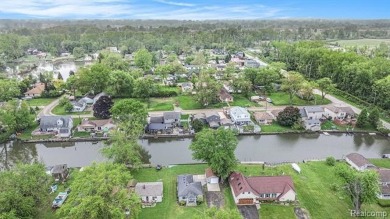 Fall in love with lake living! Just a short walk to Lake Erie on Lake Erie Metropark Golf Course in Michigan - for sale on GolfHomes.com, golf home, golf lot