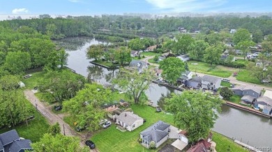 Fall in love with lake living! Just a short walk to Lake Erie on Lake Erie Metropark Golf Course in Michigan - for sale on GolfHomes.com, golf home, golf lot