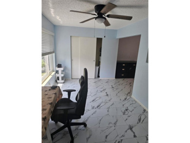 No flood Zone here! Very appealing two bedroom, two bath condo on On Top Of The World Golf Course in Florida - for sale on GolfHomes.com, golf home, golf lot