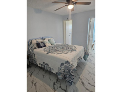 No flood Zone here! Very appealing two bedroom, two bath condo on On Top Of The World Golf Course in Florida - for sale on GolfHomes.com, golf home, golf lot