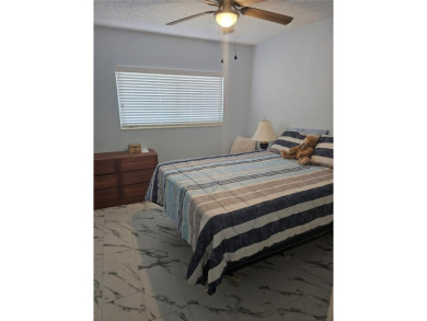 No flood Zone here! Very appealing two bedroom, two bath condo on On Top Of The World Golf Course in Florida - for sale on GolfHomes.com, golf home, golf lot