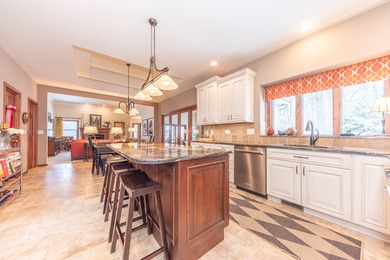 Custom-built 4-bedroom colonial set on a gorgeous 1-acre wooded on Stonebridge Golf Club in Michigan - for sale on GolfHomes.com, golf home, golf lot