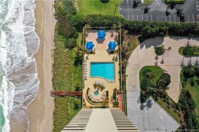 Step into a world of coastal luxury with this stunning 2BD, 2BA on Island Dunes Country Club in Florida - for sale on GolfHomes.com, golf home, golf lot