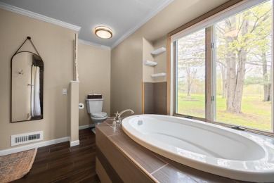 Welcome to this impeccably maintained ranch, ideally situated on on The Loon Golf Resort in Michigan - for sale on GolfHomes.com, golf home, golf lot