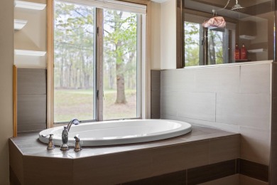 Welcome to this impeccably maintained ranch, ideally situated on on The Loon Golf Resort in Michigan - for sale on GolfHomes.com, golf home, golf lot