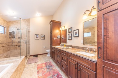 Custom-built 4-bedroom colonial set on a gorgeous 1-acre wooded on Stonebridge Golf Club in Michigan - for sale on GolfHomes.com, golf home, golf lot