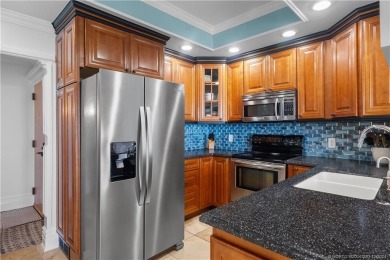 Step into a world of coastal luxury with this stunning 2BD, 2BA on Island Dunes Country Club in Florida - for sale on GolfHomes.com, golf home, golf lot