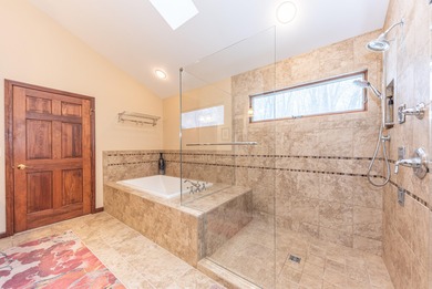 Custom-built 4-bedroom colonial set on a gorgeous 1-acre wooded on Stonebridge Golf Club in Michigan - for sale on GolfHomes.com, golf home, golf lot