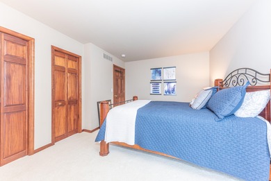 Custom-built 4-bedroom colonial set on a gorgeous 1-acre wooded on Stonebridge Golf Club in Michigan - for sale on GolfHomes.com, golf home, golf lot