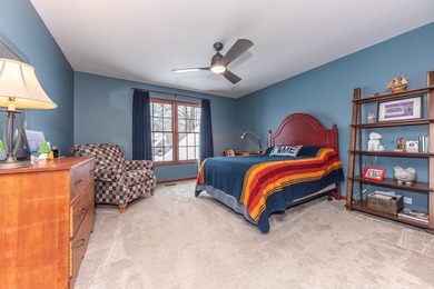 Custom-built 4-bedroom colonial set on a gorgeous 1-acre wooded on Stonebridge Golf Club in Michigan - for sale on GolfHomes.com, golf home, golf lot