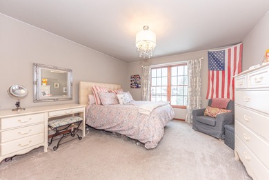 Custom-built 4-bedroom colonial set on a gorgeous 1-acre wooded on Stonebridge Golf Club in Michigan - for sale on GolfHomes.com, golf home, golf lot