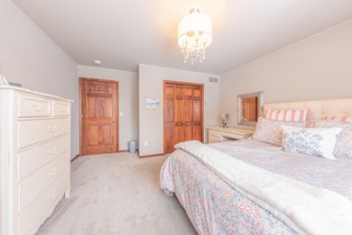 Custom-built 4-bedroom colonial set on a gorgeous 1-acre wooded on Stonebridge Golf Club in Michigan - for sale on GolfHomes.com, golf home, golf lot