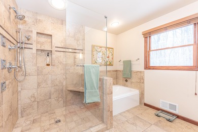 Custom-built 4-bedroom colonial set on a gorgeous 1-acre wooded on Stonebridge Golf Club in Michigan - for sale on GolfHomes.com, golf home, golf lot