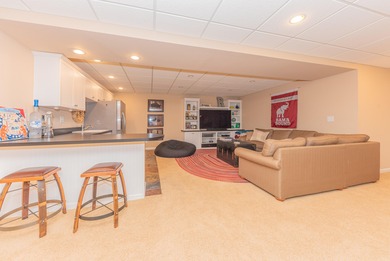 Custom-built 4-bedroom colonial set on a gorgeous 1-acre wooded on Stonebridge Golf Club in Michigan - for sale on GolfHomes.com, golf home, golf lot