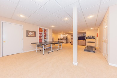 Custom-built 4-bedroom colonial set on a gorgeous 1-acre wooded on Stonebridge Golf Club in Michigan - for sale on GolfHomes.com, golf home, golf lot