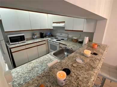 WELCOME HOME!! THIS IMMACULATE HIBISCUS MODEL OFFERS ONE OF THE on Flamingo Lakes Country Club in Florida - for sale on GolfHomes.com, golf home, golf lot