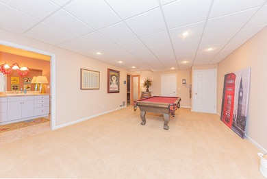 Custom-built 4-bedroom colonial set on a gorgeous 1-acre wooded on Stonebridge Golf Club in Michigan - for sale on GolfHomes.com, golf home, golf lot