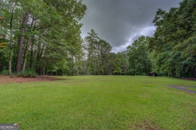 A hidden gem and rare opportunity right off the desirable on Indian Creek Golf Club in Georgia - for sale on GolfHomes.com, golf home, golf lot