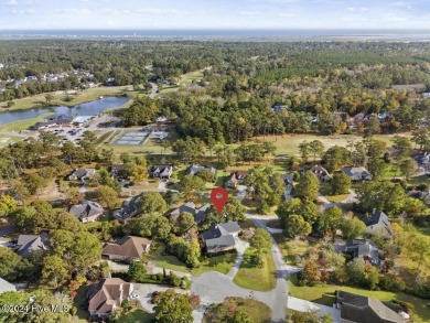 Welcome to an exquisite, custom built, 1.5 story home on a on Olde Point Golf and Country Club in North Carolina - for sale on GolfHomes.com, golf home, golf lot