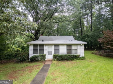 A hidden gem and rare opportunity right off the desirable on Indian Creek Golf Club in Georgia - for sale on GolfHomes.com, golf home, golf lot