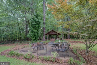 A hidden gem and rare opportunity right off the desirable on Indian Creek Golf Club in Georgia - for sale on GolfHomes.com, golf home, golf lot