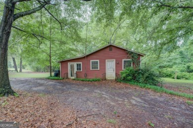 A hidden gem and rare opportunity right off the desirable on Indian Creek Golf Club in Georgia - for sale on GolfHomes.com, golf home, golf lot