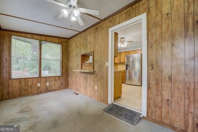 A hidden gem and rare opportunity right off the desirable on Indian Creek Golf Club in Georgia - for sale on GolfHomes.com, golf home, golf lot