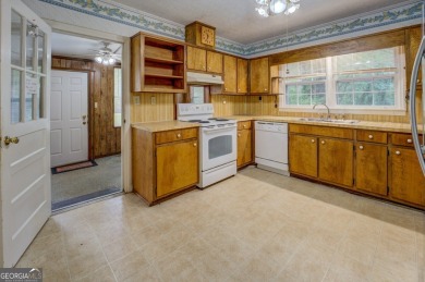 A hidden gem and rare opportunity right off the desirable on Indian Creek Golf Club in Georgia - for sale on GolfHomes.com, golf home, golf lot