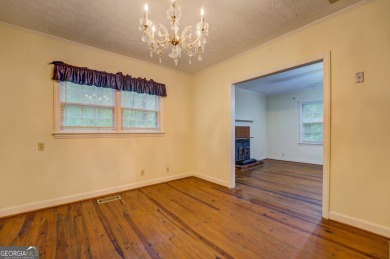 A hidden gem and rare opportunity right off the desirable on Indian Creek Golf Club in Georgia - for sale on GolfHomes.com, golf home, golf lot