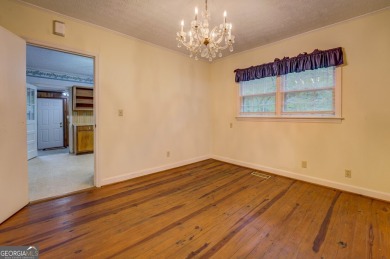 A hidden gem and rare opportunity right off the desirable on Indian Creek Golf Club in Georgia - for sale on GolfHomes.com, golf home, golf lot