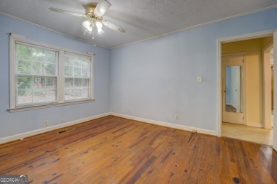 A hidden gem and rare opportunity right off the desirable on Indian Creek Golf Club in Georgia - for sale on GolfHomes.com, golf home, golf lot