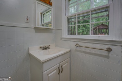 A hidden gem and rare opportunity right off the desirable on Indian Creek Golf Club in Georgia - for sale on GolfHomes.com, golf home, golf lot
