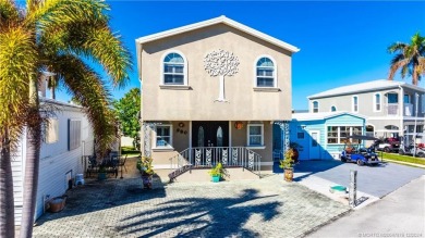 This residence boasts a spacious, open-concept design, perfectly on Island Dunes Country Club in Florida - for sale on GolfHomes.com, golf home, golf lot