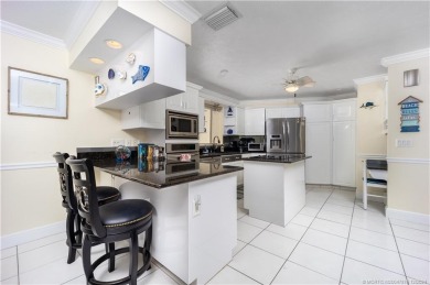 This residence boasts a spacious, open-concept design, perfectly on Island Dunes Country Club in Florida - for sale on GolfHomes.com, golf home, golf lot