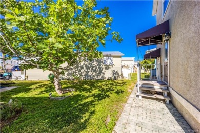 This residence boasts a spacious, open-concept design, perfectly on Island Dunes Country Club in Florida - for sale on GolfHomes.com, golf home, golf lot