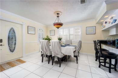 This residence boasts a spacious, open-concept design, perfectly on Island Dunes Country Club in Florida - for sale on GolfHomes.com, golf home, golf lot