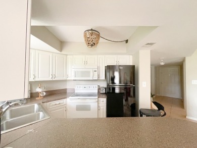 Discover this 2-bedroom, 2-bath first-floor condo in Quail on Quail Run Golf Club In Naples in Florida - for sale on GolfHomes.com, golf home, golf lot