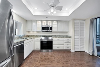 Waterfront End Unit with Breathtaking Sunsets & Natural Charm! on IMG Academies Golf and Country Club in Florida - for sale on GolfHomes.com, golf home, golf lot