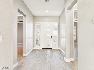 Welcome to refined living in Ovation at Mountain Falls. This on Mountain Falls Golf Course in Nevada - for sale on GolfHomes.com, golf home, golf lot