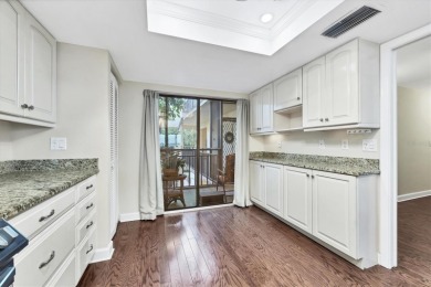 Waterfront End Unit with Breathtaking Sunsets & Natural Charm! on IMG Academies Golf and Country Club in Florida - for sale on GolfHomes.com, golf home, golf lot