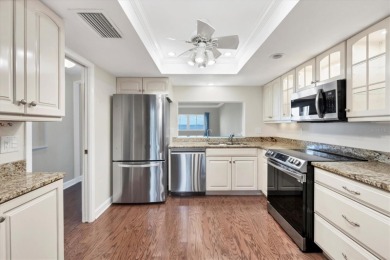 Waterfront End Unit with Breathtaking Sunsets & Natural Charm! on IMG Academies Golf and Country Club in Florida - for sale on GolfHomes.com, golf home, golf lot