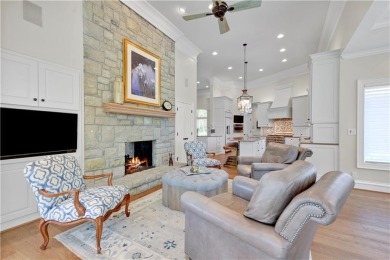 Experience refined living and ultimate privacy in this fully on Loch Lloyd Country Club in Missouri - for sale on GolfHomes.com, golf home, golf lot