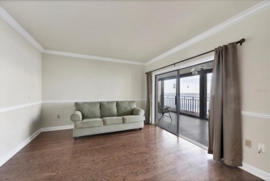 Waterfront End Unit with Breathtaking Sunsets & Natural Charm! on IMG Academies Golf and Country Club in Florida - for sale on GolfHomes.com, golf home, golf lot