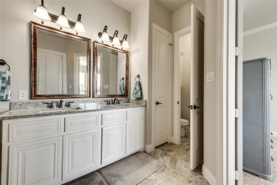 Elegant 1.5-story home at 2000 Fox Bend Trace in the Bridges at on The Bridges Golf Club in Texas - for sale on GolfHomes.com, golf home, golf lot