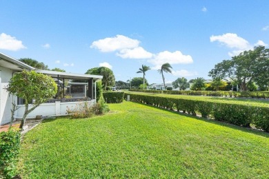 Lowest priced villa in the highly desirable Cypress Lakes on Cypress Lakes Golf Course - West Palm Beach in Florida - for sale on GolfHomes.com, golf home, golf lot