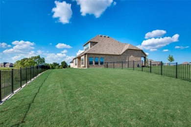 Elegant 1.5-story home at 2000 Fox Bend Trace in the Bridges at on The Bridges Golf Club in Texas - for sale on GolfHomes.com, golf home, golf lot