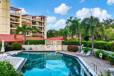 Waterfront End Unit with Breathtaking Sunsets & Natural Charm! on IMG Academies Golf and Country Club in Florida - for sale on GolfHomes.com, golf home, golf lot