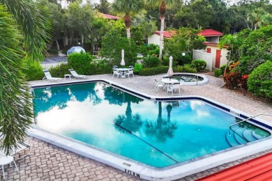 Waterfront End Unit with Breathtaking Sunsets & Natural Charm! on IMG Academies Golf and Country Club in Florida - for sale on GolfHomes.com, golf home, golf lot