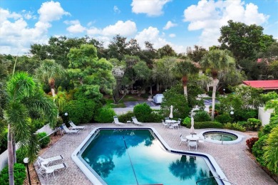 Waterfront End Unit with Breathtaking Sunsets & Natural Charm! on IMG Academies Golf and Country Club in Florida - for sale on GolfHomes.com, golf home, golf lot