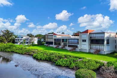 Waterfront End Unit with Breathtaking Sunsets & Natural Charm! on IMG Academies Golf and Country Club in Florida - for sale on GolfHomes.com, golf home, golf lot